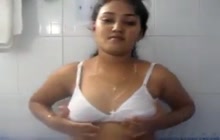 Indian girl playing with her tits